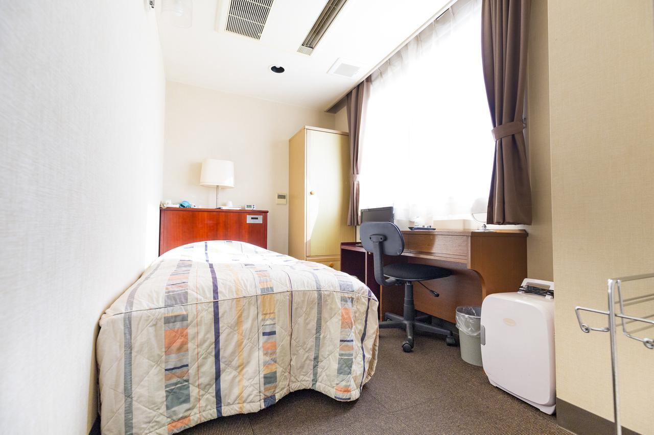 Business Hotel Serikawa Хиконе Стая снимка